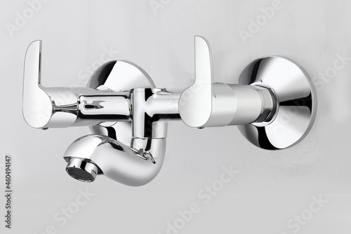 Modern stainless steel water tap. Isolated on white  Grey background| Plumbing for bathroom shower