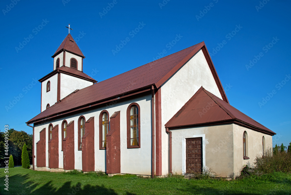 General view and close-up of architectural details of the Catholic Auxiliary Church of Our Lady of Ostra Brama in Sędki in Masuria in Poland.