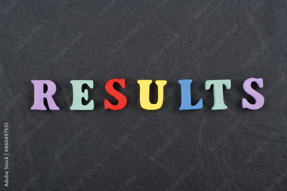 RESULTS word on black board background composed from colorful abc alphabet block wooden letters, copy space for ad text. Learning english concept. RESULTS word on black board background composed from colorful abc alphabet block wooden letters, copy space for ad text. Learning english concept.