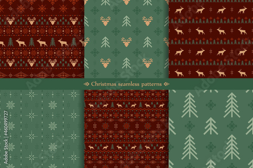 Vector classic christmas seamless patterns set with stylized reindeers, spruces and snowflakes. Collection of red and green traditional ornate geometric backgrounds in scandinavian style