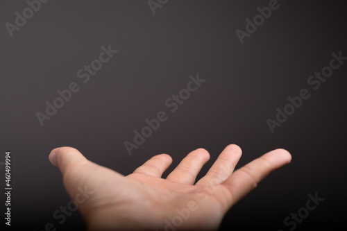 man mid section with hand out