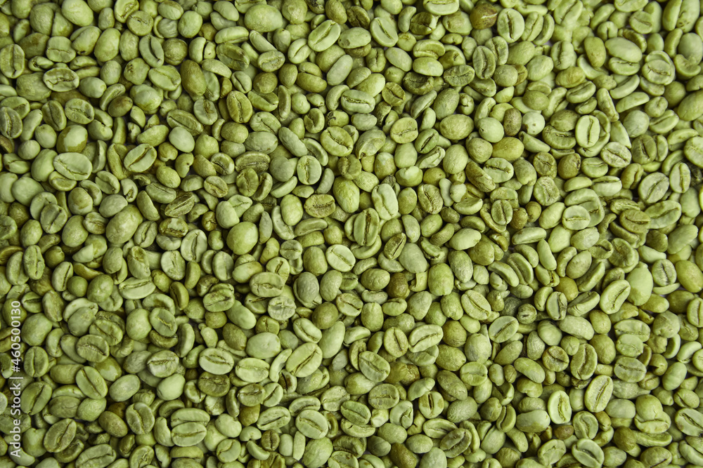Pile of green coffee beans as background, closeup Pile of green coffee beans as background, closeup
