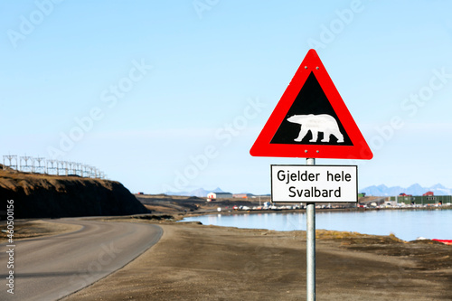 Polar bear warning sign in Svalbard, located at the end of Longyearbyen town. Translation 