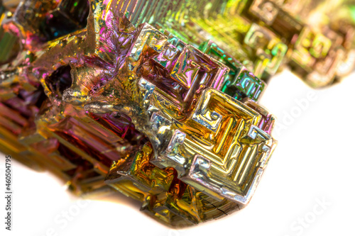 Macro of the mineral bismuth stone on a white background