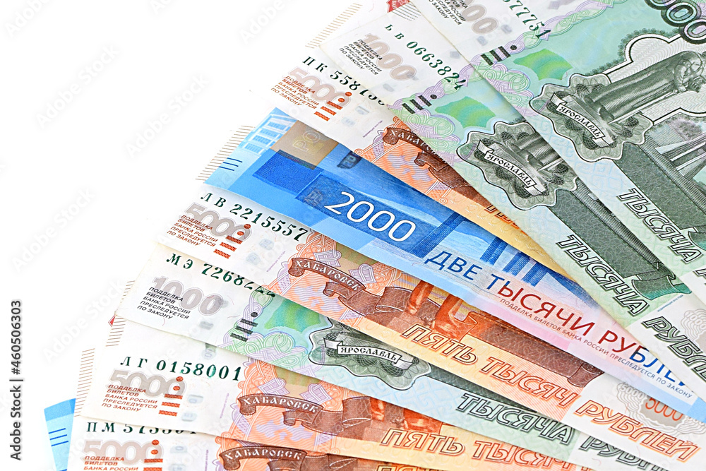 Russian banknotes are fanned out, isolated on a white background. Currency exchange. Money background. Financial crisis, ruble devaluation concept. Russian banknotes are fanned out, isolated on a white background. Currency exchange. Money background. Financial crisis, ruble devaluation concept.
