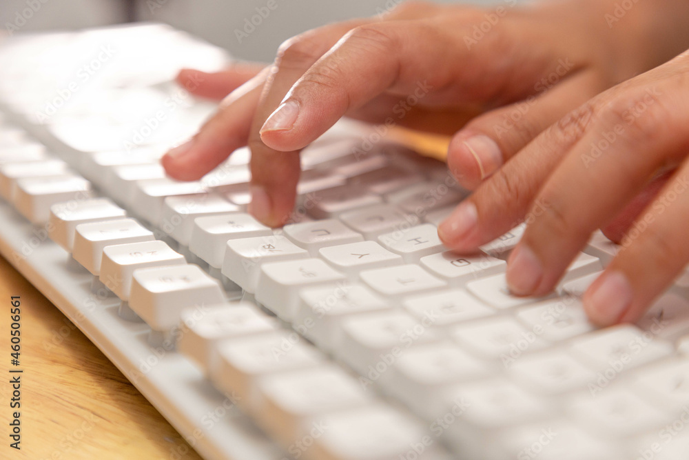 Female office worker typing on the keyboard
Female office worker typing on the keyboard