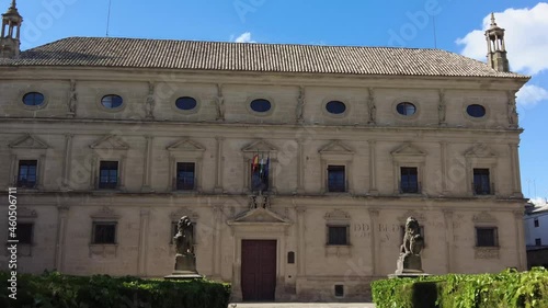 A dolly shot of the facade of Vazquez de Molina Palace on a sunnyin 4K photo