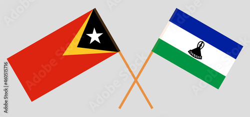 Crossed flags of East Timor and Kingdom of Lesotho. Official colors. Correct proportion Free Download Crossed flags of East Timor and Kingdom of Lesotho. Official colors. Correct proportion - GFXLoad