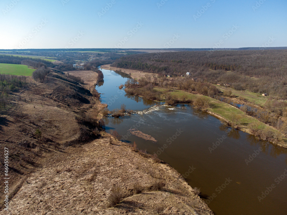 aerial landscape of winding river in field, top view of beautiful nature texture from drone
