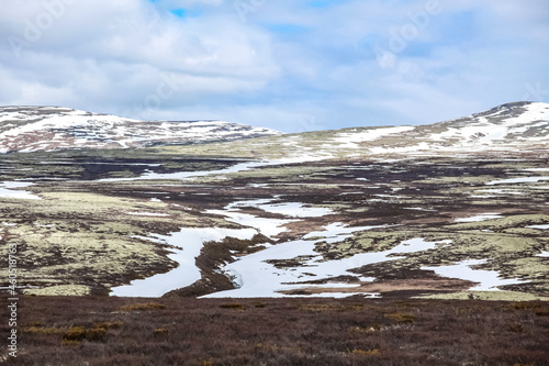 landscape with snow Rondane, Norway, spring