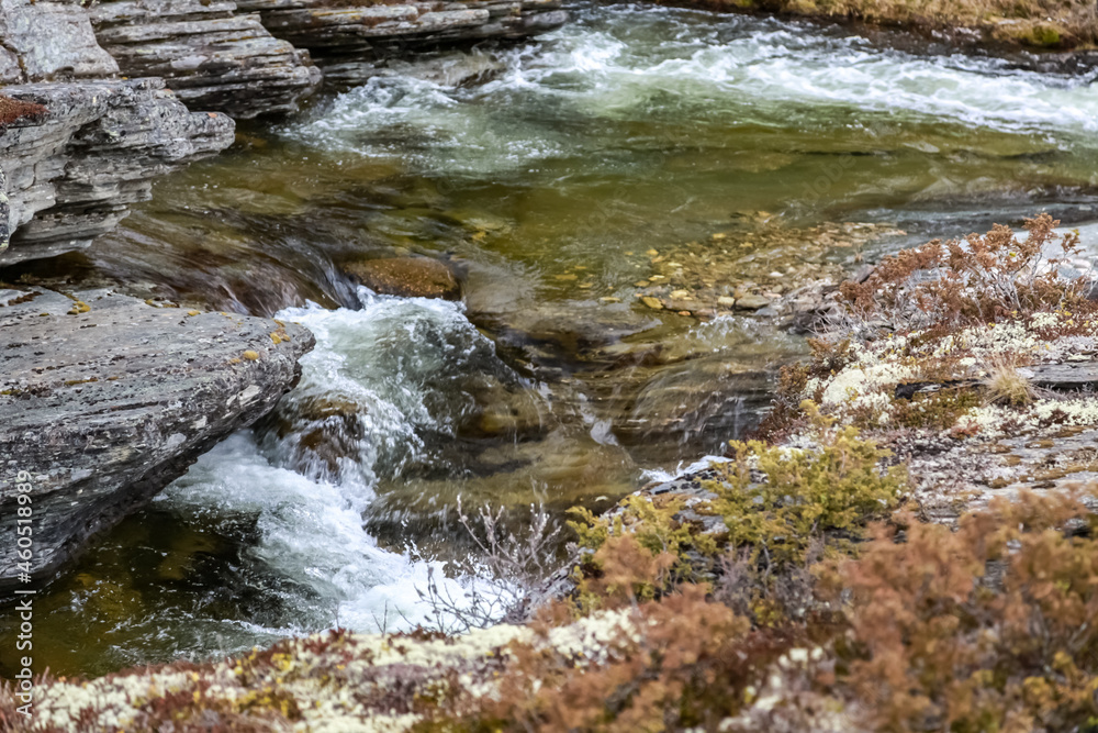 water flowing over rocks Høvringen, Rondane, Norway, spring water flowing over rocks Høvringen, Rondane, Norway, spring