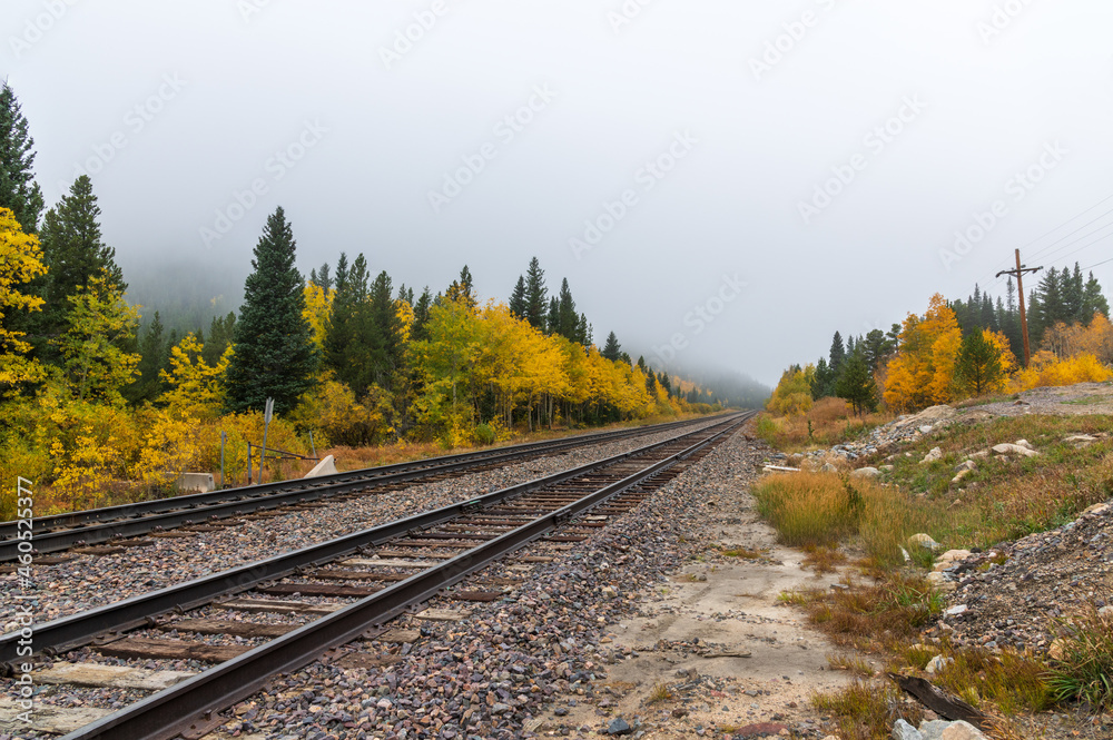 Obraz premium Train tracks in the fall. Colorado mountains. 