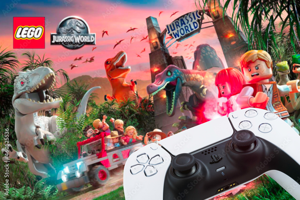 Playstation 5 Dual Sense Controller with Lego Jurassic World game blurred  in the background. Rio de Janeiro, RJ, Brazil. October 2021. Stock Photo |  Adobe Stock