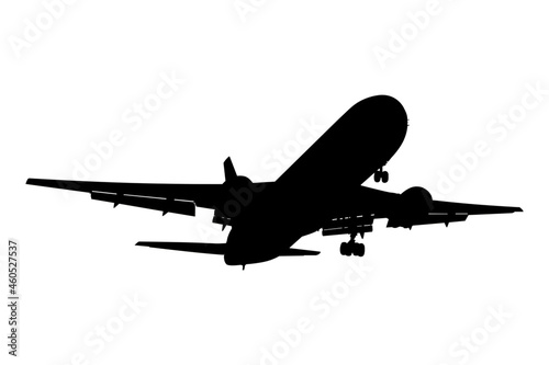 Silhouette of two-engine passenger plane landing