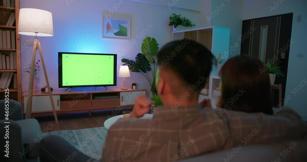 couple watch green screen TV couple watch green screen TV