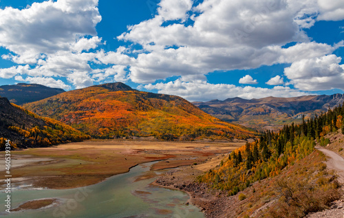 Rocky Mountain Landscape With River At Fall Time