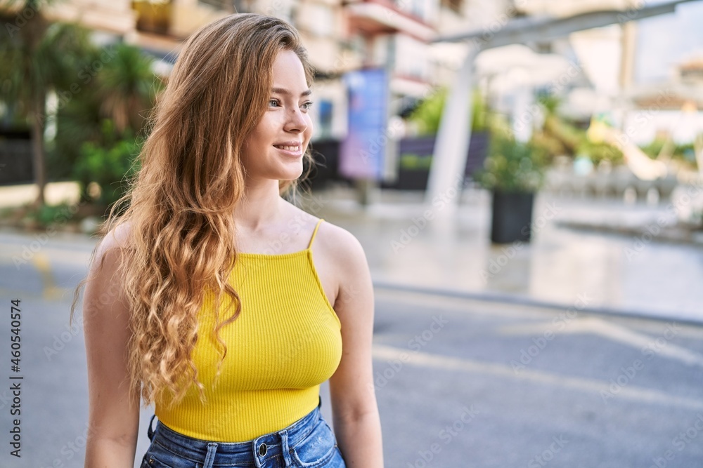 Young caucasian girl smiling confident at street