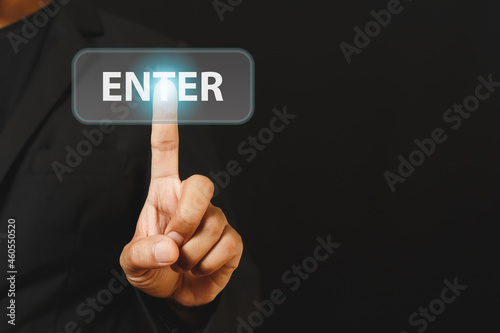 Businessman finger touch press enter button. hand click online digital.