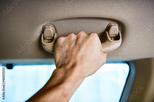 Car`s grab handle,Holding plastic car grab handler for the passenger.