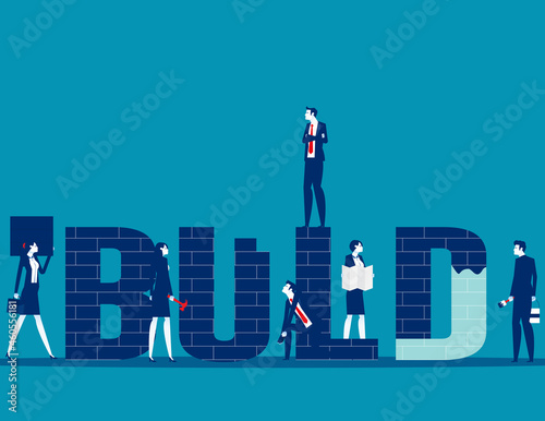 People are working on construction around the large letters. BUILD banner concept