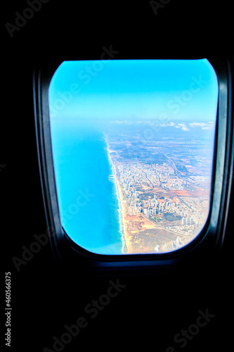 view from the plane window of the city of Tel Aviv and the Mediterranean coast  Israel from above on a sunny day