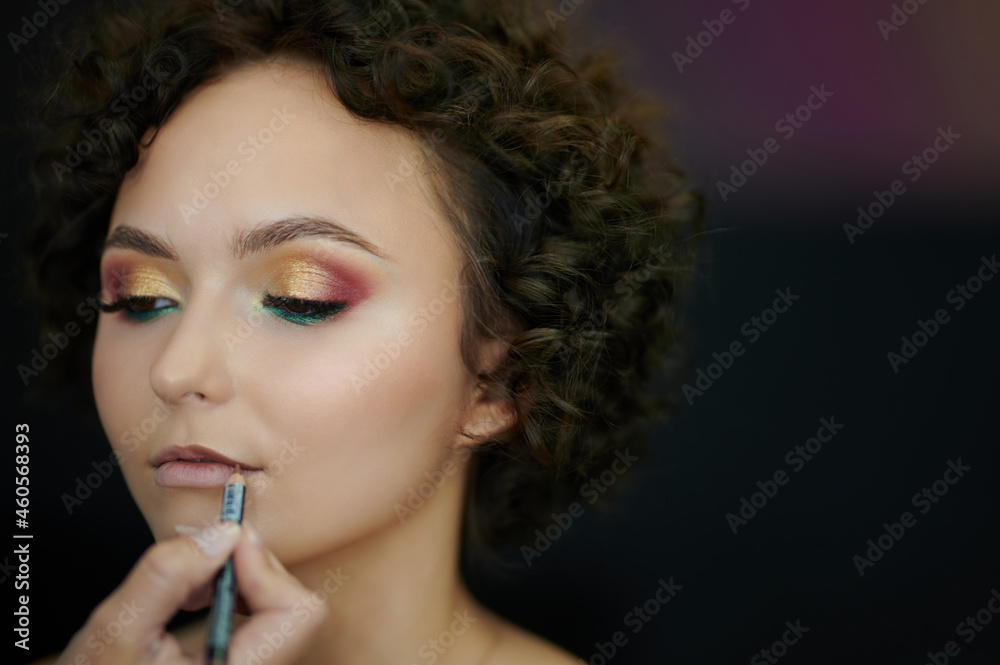 Fototapeta premium Making lines on woman lips