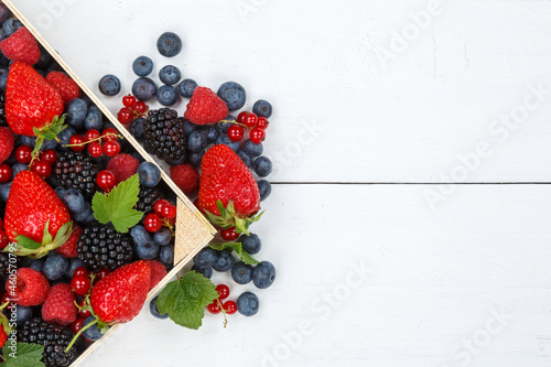 Fototapeta Naklejka Na Ścianę i Meble -  Berries fruits berry fruit strawberries strawberry blueberries blueberry with copyspace copy space from above