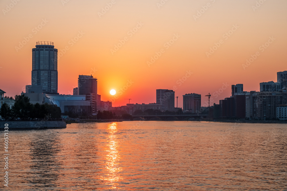 Sunset on a pond in the center of the city. Yekaterinburg, Russia