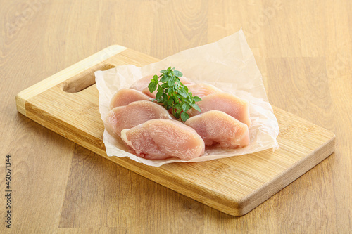 Raw chicken breast slices for cooking