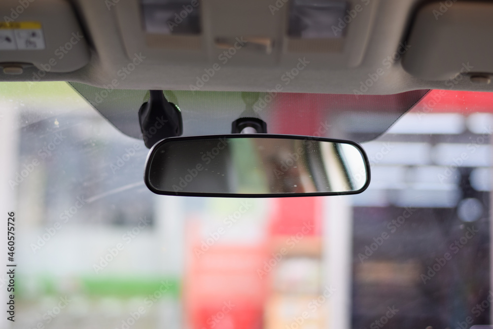 Fotografie Car rear view mirror inside the car.
