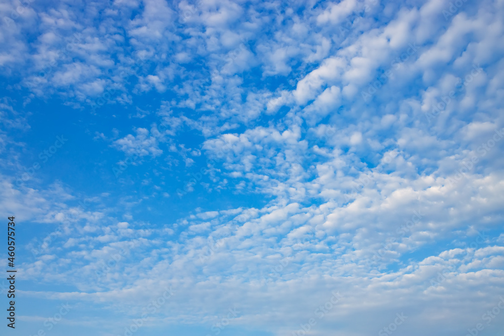 blue sky with white spindrift clouds on day blue sky with white spindrift clouds on day