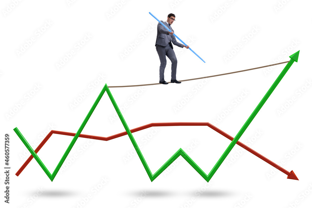 Businessman balancing on tightrope on line chart Businessman balancing on tightrope on line chart