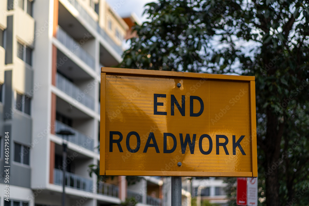 sign on the street saying End Roadwork