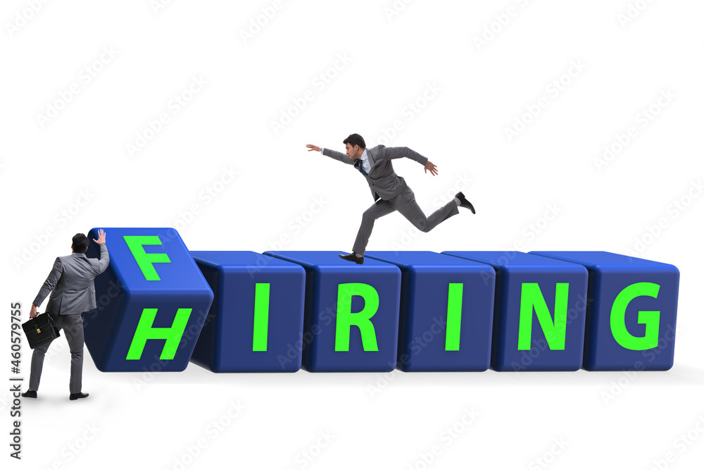 Hiring and firing concept with turning cubes Hiring and firing concept with turning cubes