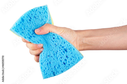 Hand with holding a sponge, isolated on white background. Cleaning concept.
