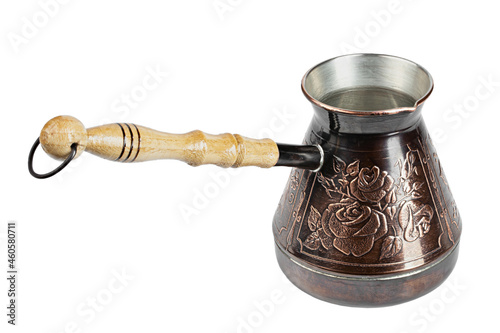 Turkish coffee pot. Ibrik - small copper coffee pot isolated on white background.