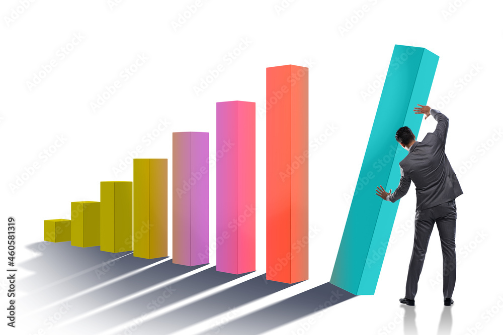 Businessman supporting economic growth on chart Businessman supporting economic growth on chart