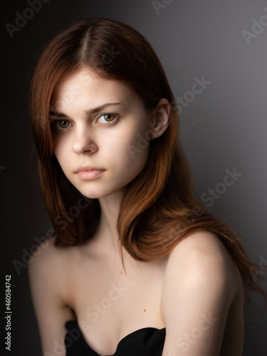 beautiful woman red hair naked shoulders posing Lifestyle Studio