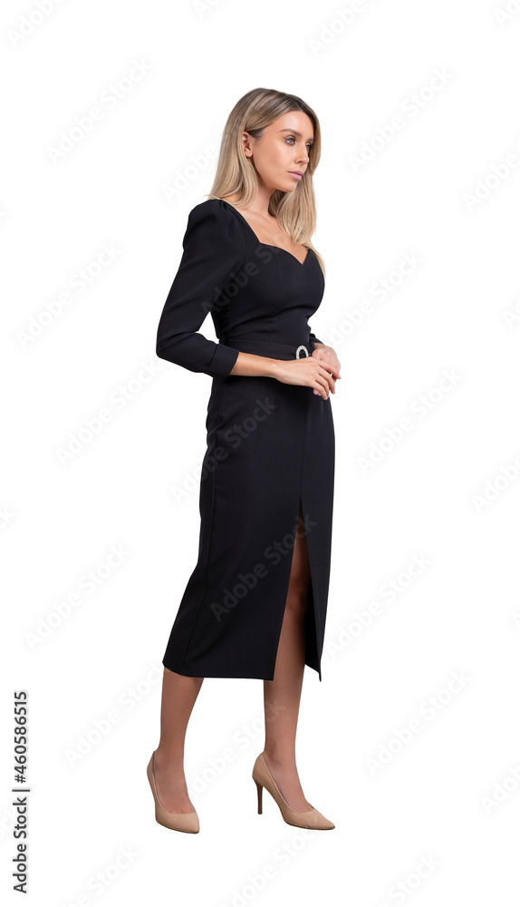 Side view of attractive businesswoman in black formal dress with confident look, isolated over white background. Concept of personal growth, management and success. Woman in business concept. Side view of attractive businesswoman in black formal dress with confident look, isolated over white background. Concept of personal growth, management and success. Woman in business concept.