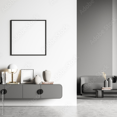 White and grey living room areas with empty square frame on wall