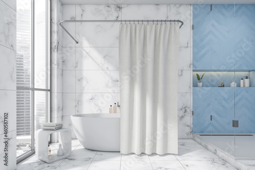 White and blue bathroom with two tone tiles photo