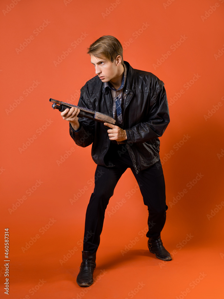 Naklejka premium a cool hunter of evil spirits, a guy in a casual shirt and a leather jacket