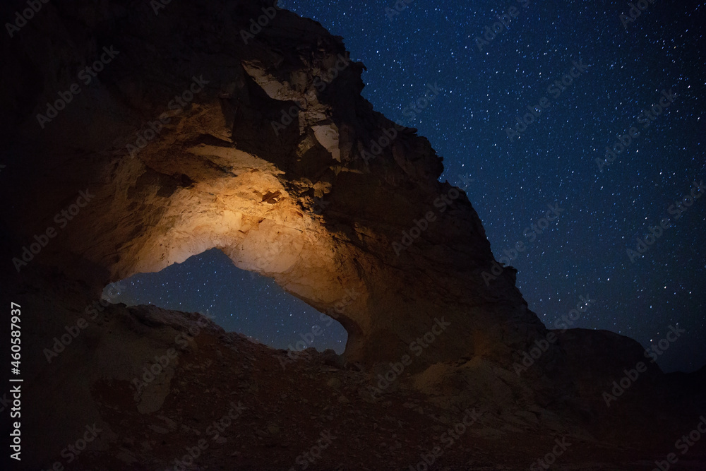 Night starry sky in the Sahara desert.