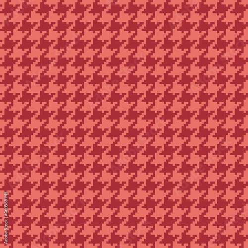 Houndstooth check pattern in reddish coral pink. Seamless spring autumn dog tooth background graphic for scarf, coat, dress, other modern fashion textile print. Pixel goose foot design.