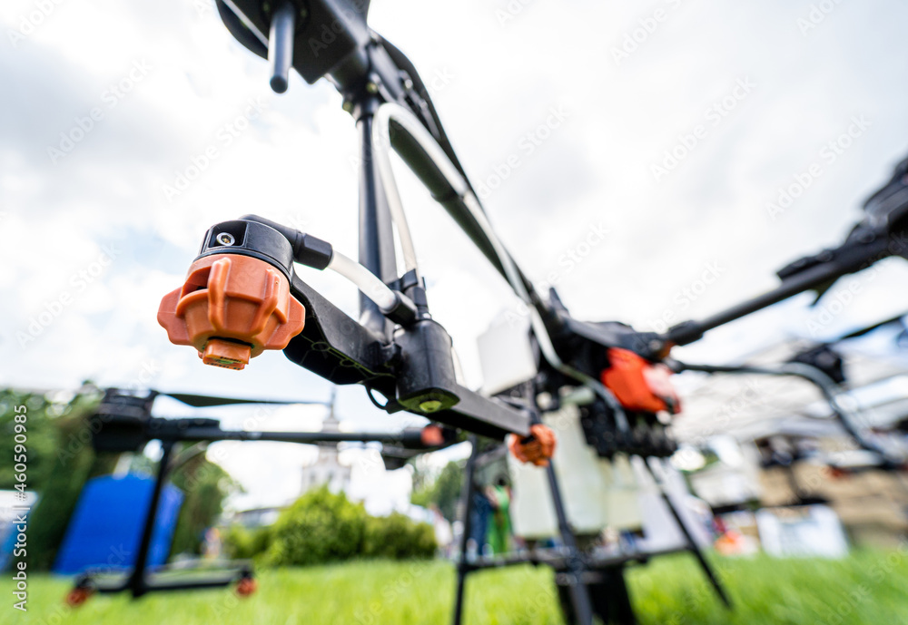 Professional agriculture drone on the green field Professional agriculture drone on the green field