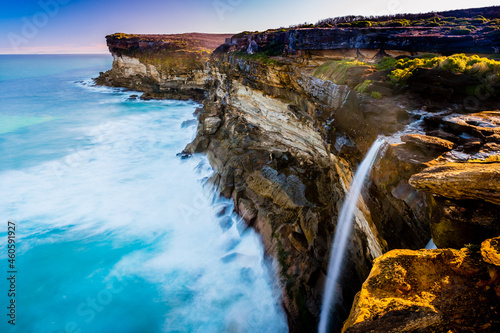 Seascape, coast cliff, and waterfalls in Royal National Park