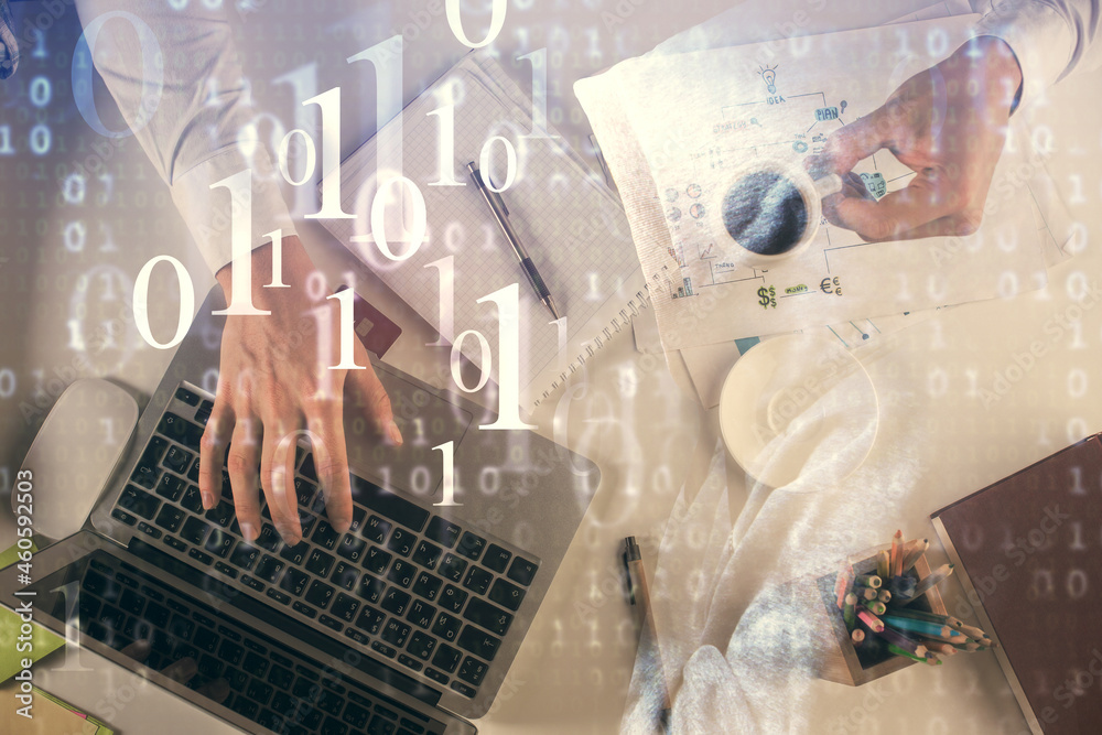 Double exposure of man's hands typing over computer keyboard and data theme hologram drawing. Top view. Technology concept. Double exposure of man's hands typing over computer keyboard and data theme hologram drawing. Top view. Technology concept.