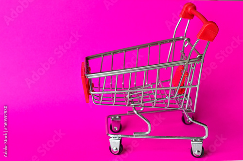 Cart Trolley, empty shopping cart, pink background