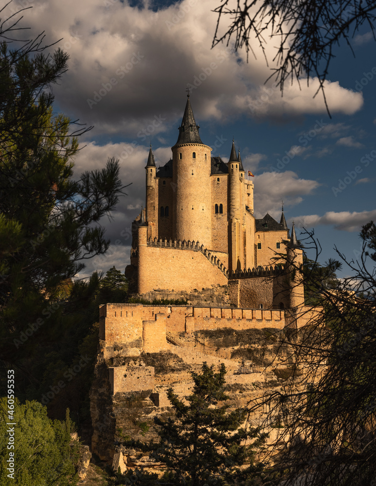 Front view of the Alcazar of Segovia medieval castle fortress at sunset