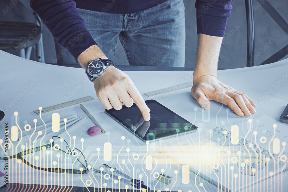 Double exposure of man's hand holding and using a digital device and data theme drawing. Technology concept. Double exposure of man's hand holding and using a digital device and data theme drawing. Technology concept.